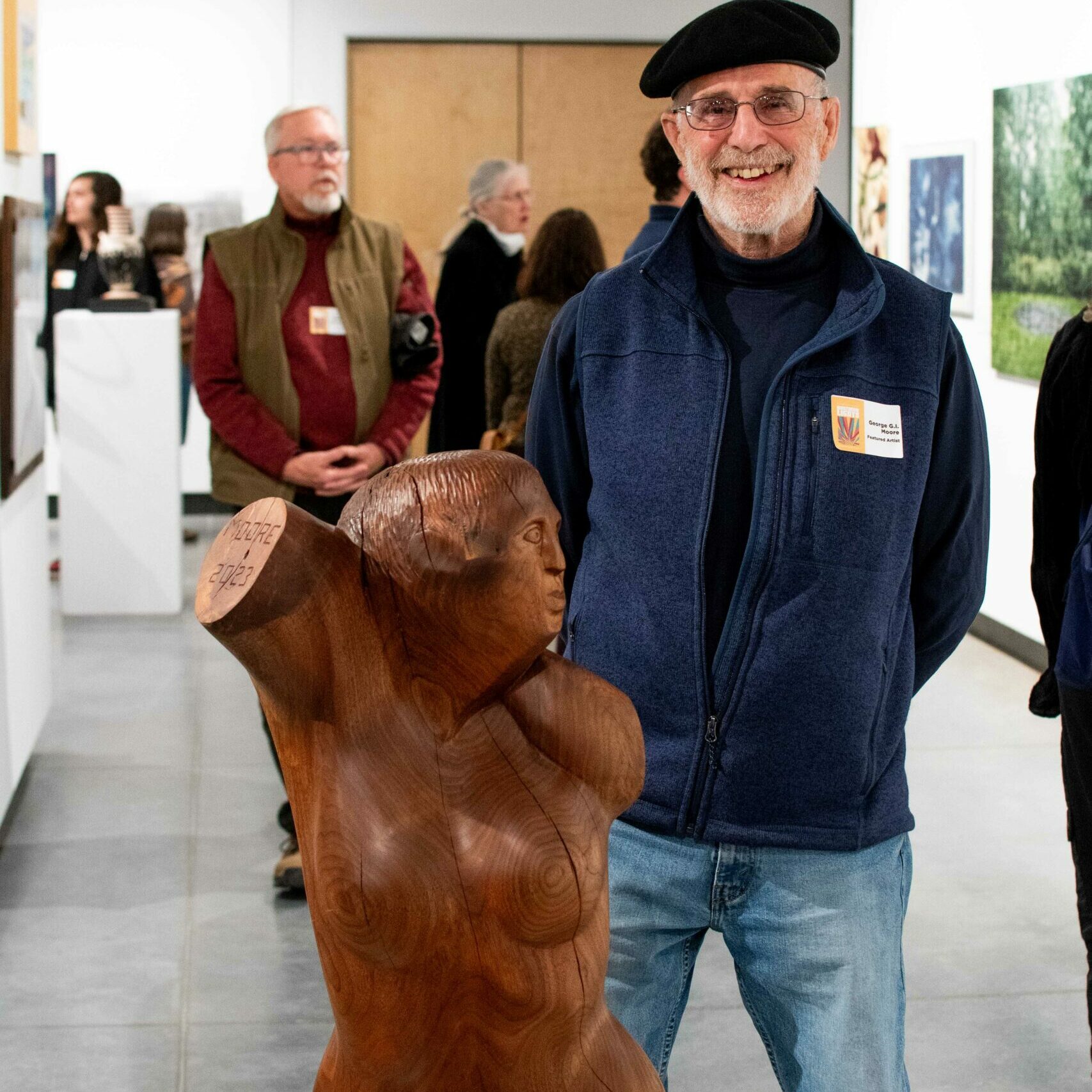 George GI Moore and walnut sculpture "Shotputter" at the 50th Annual Northern Lights Exhibition in 2024.
